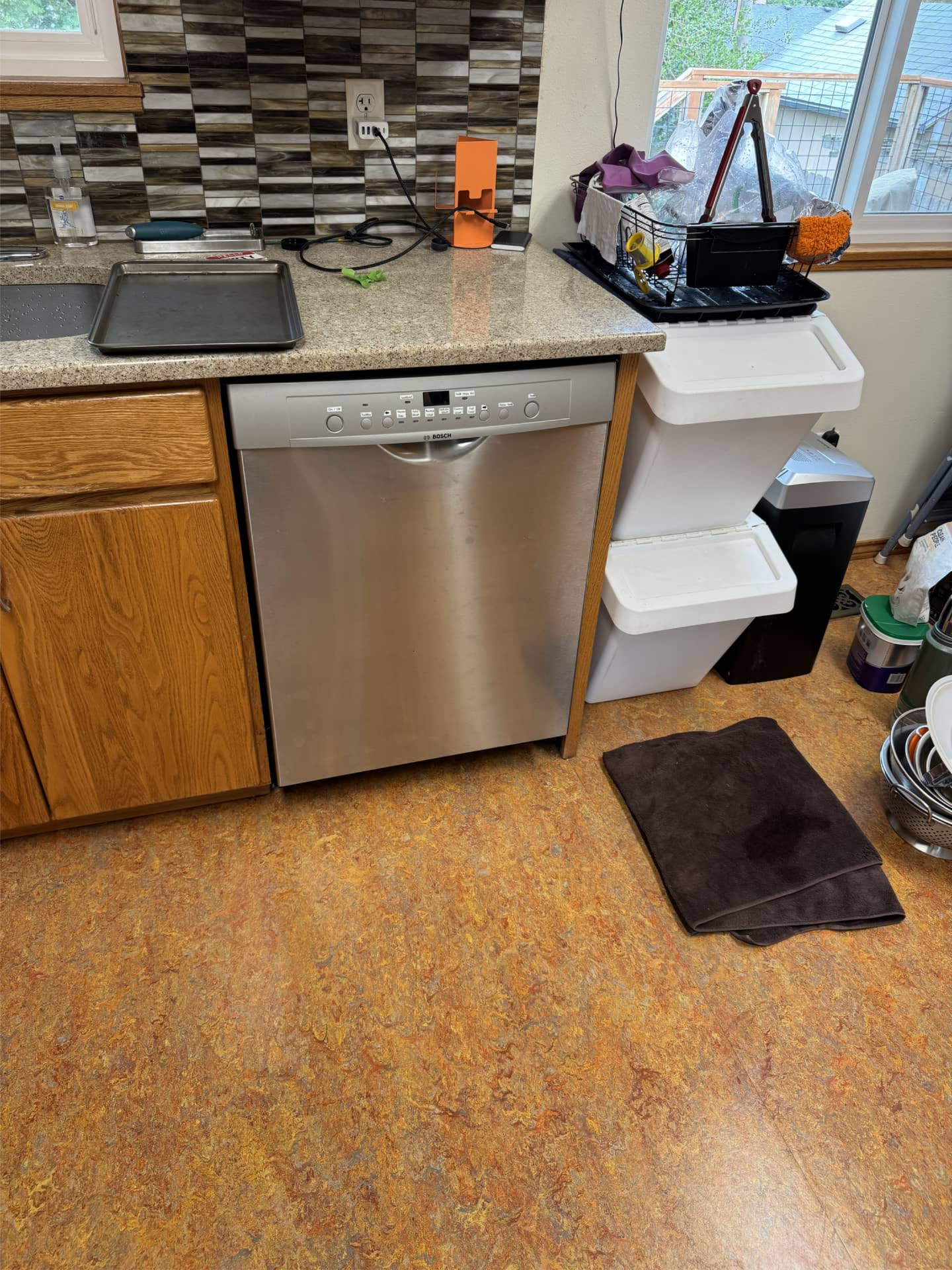Water leak under Bosch dishwasher caused by faulty water valve component