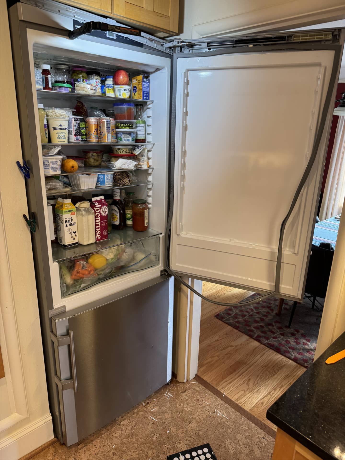 Liebherr refrigerator with door panel removed for door seal replacement in Portland, OR 97211