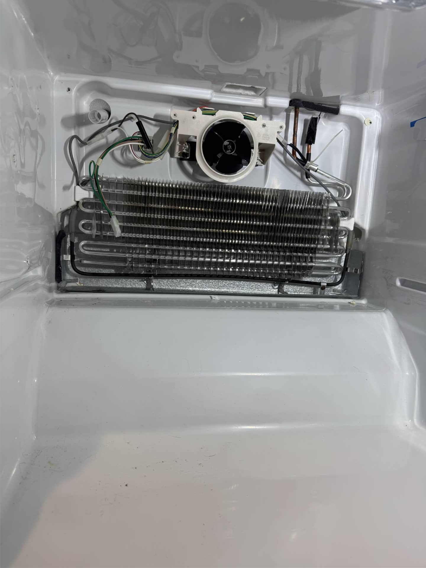Whirlpool refrigerator evaporator area during fan replacement in Portland, OR 97214