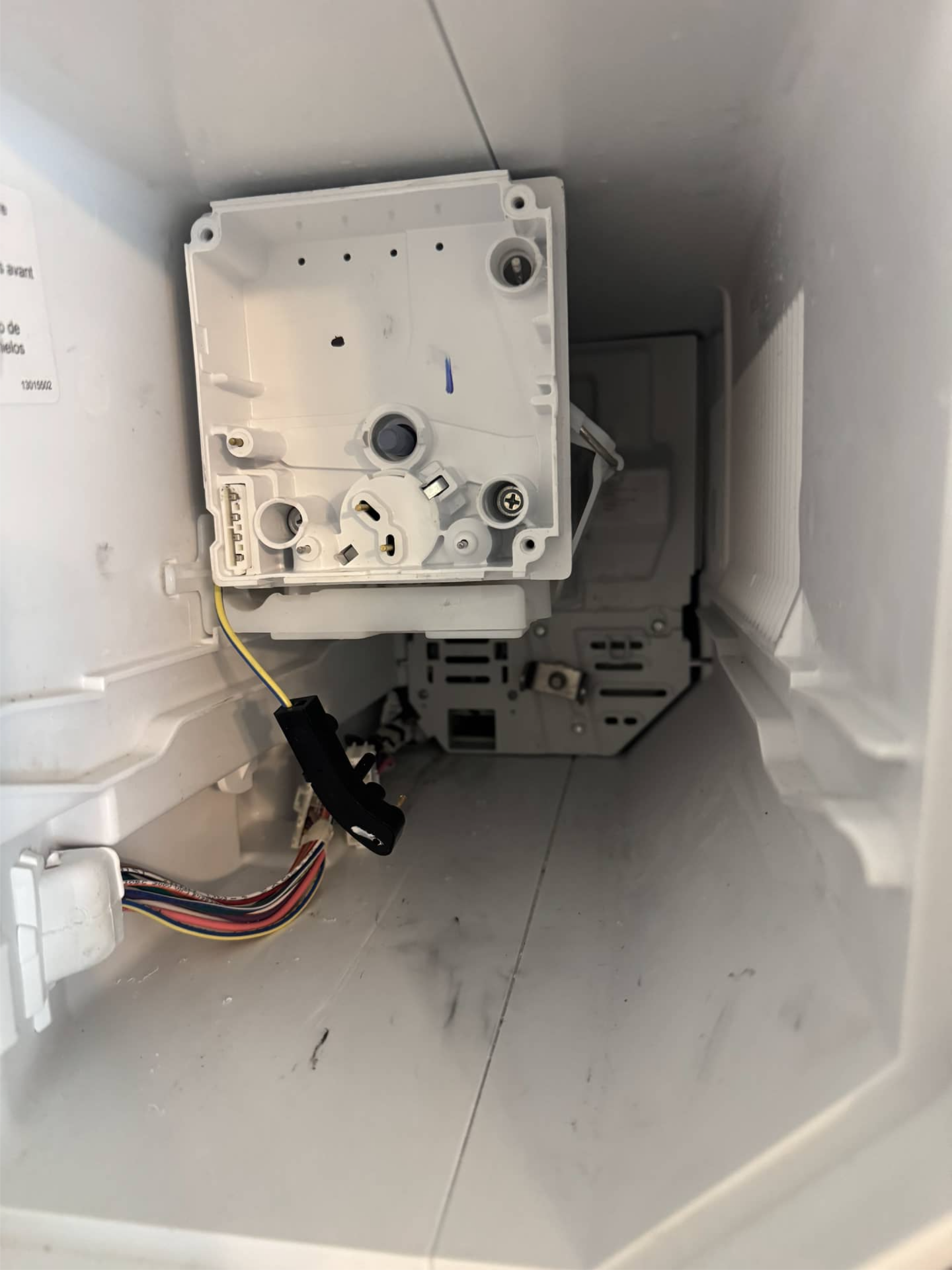 Whirlpool refrigerator icemaker removed during replacement in Vancouver, WA 98682