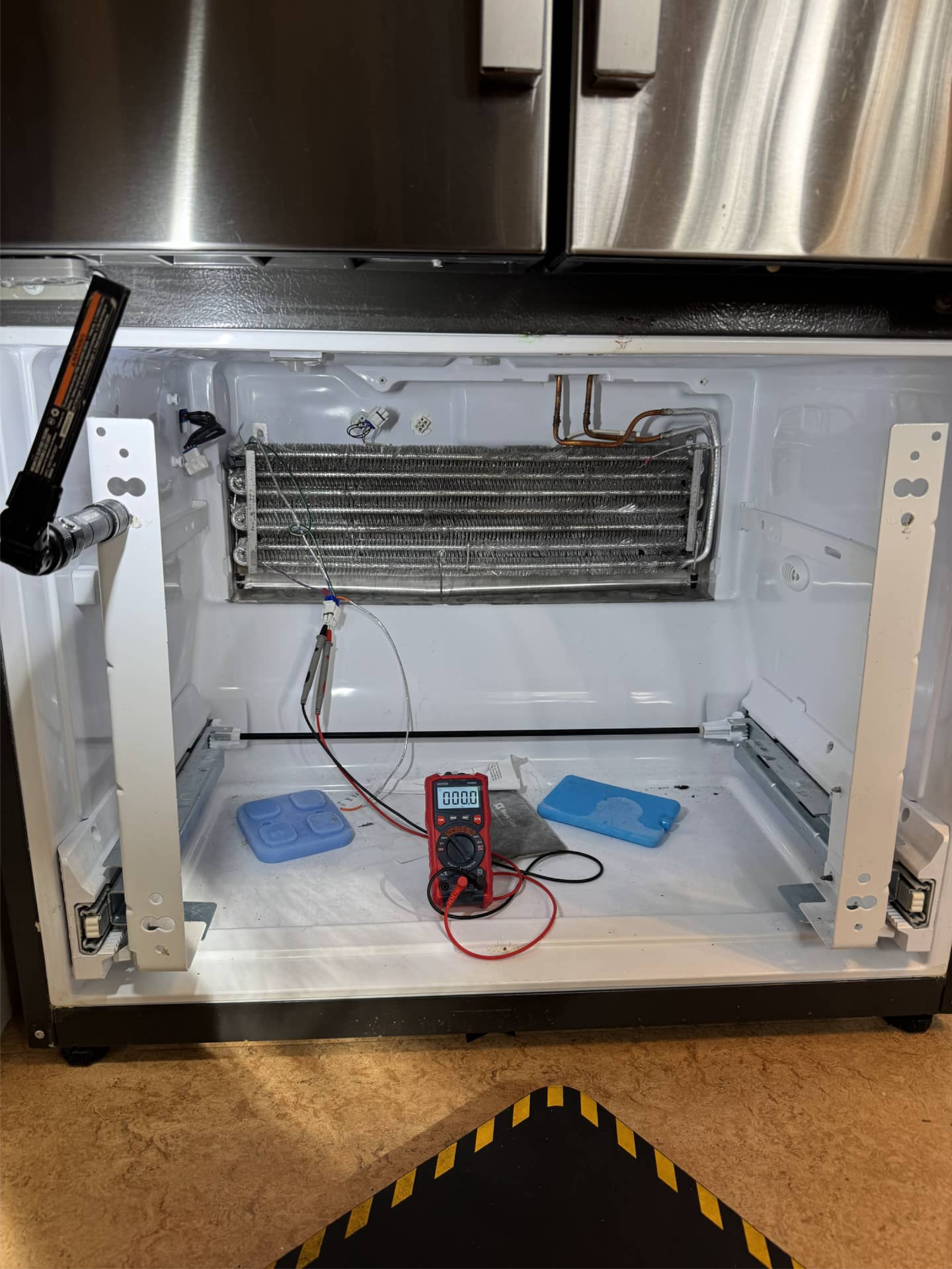 GE refrigerator evaporator during defrost system diagnostics in Portland, OR 97213