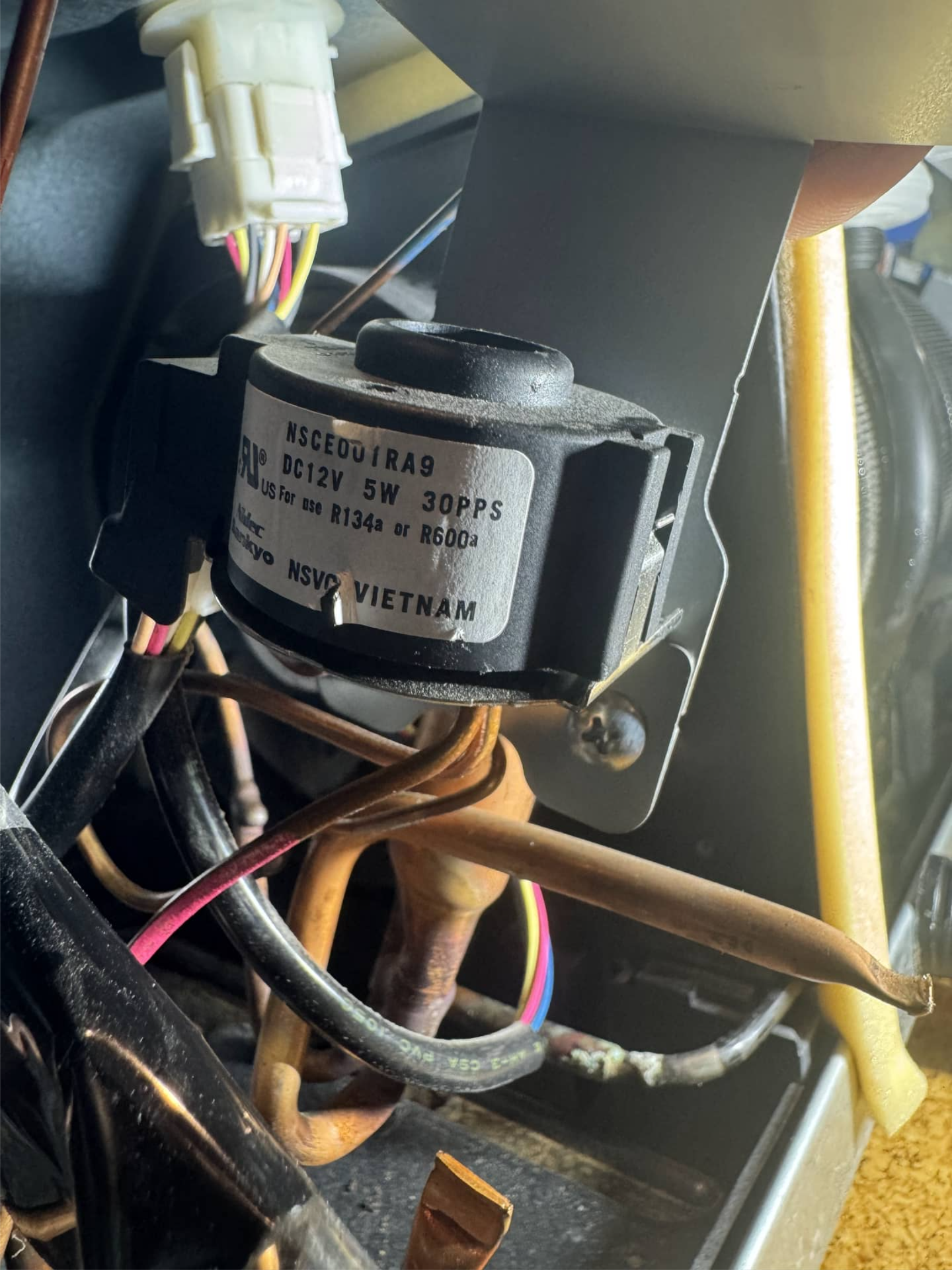 GE refrigerator valve during fresh food cooling repair in Newberg, OR 97132