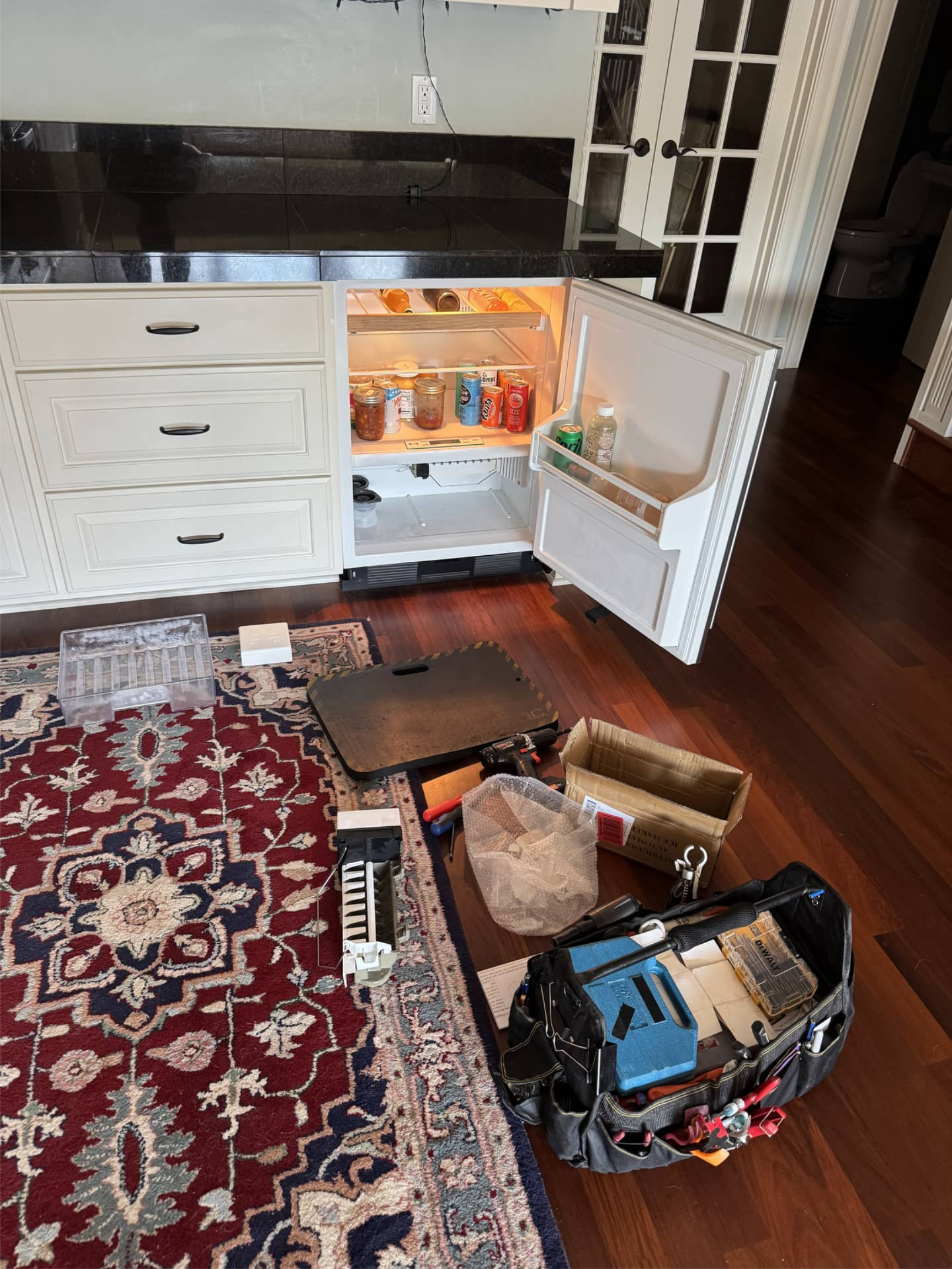 Sub-Zero mini refrigerator during ice maker replacement in Portland, OR 97202