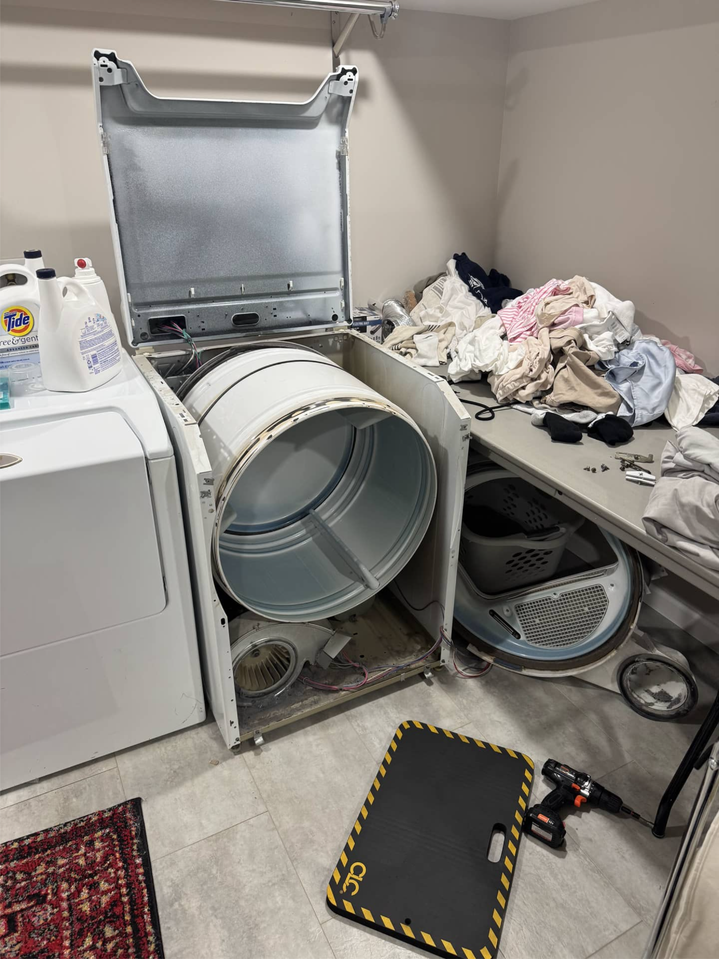 Maytag dryer disassembled for squeaking noise repair in Portland, OR 97212