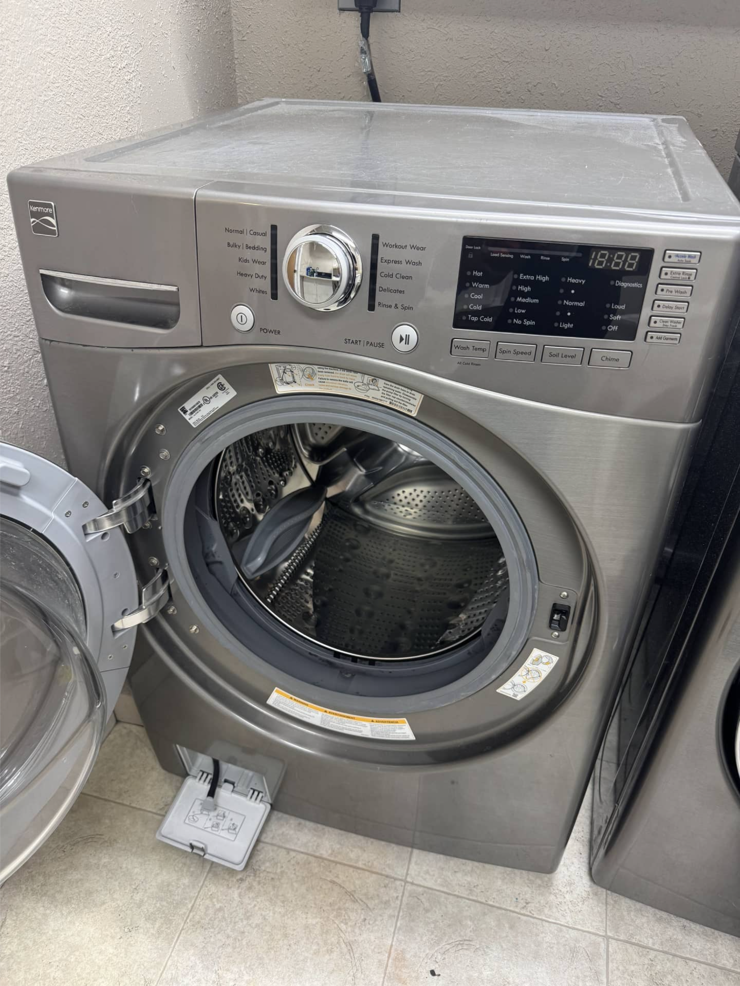 Kenmore washer opened for drain pump replacement in Portland, OR 97212