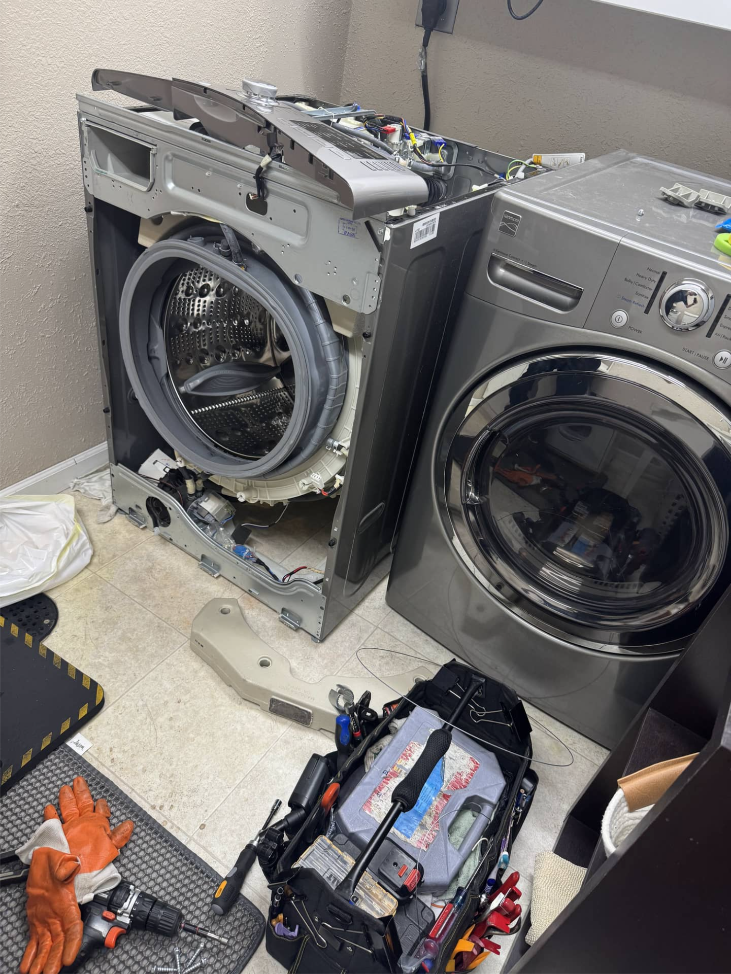Kenmore washing machine disassembled during drain pump repair in Portland, OR 97212