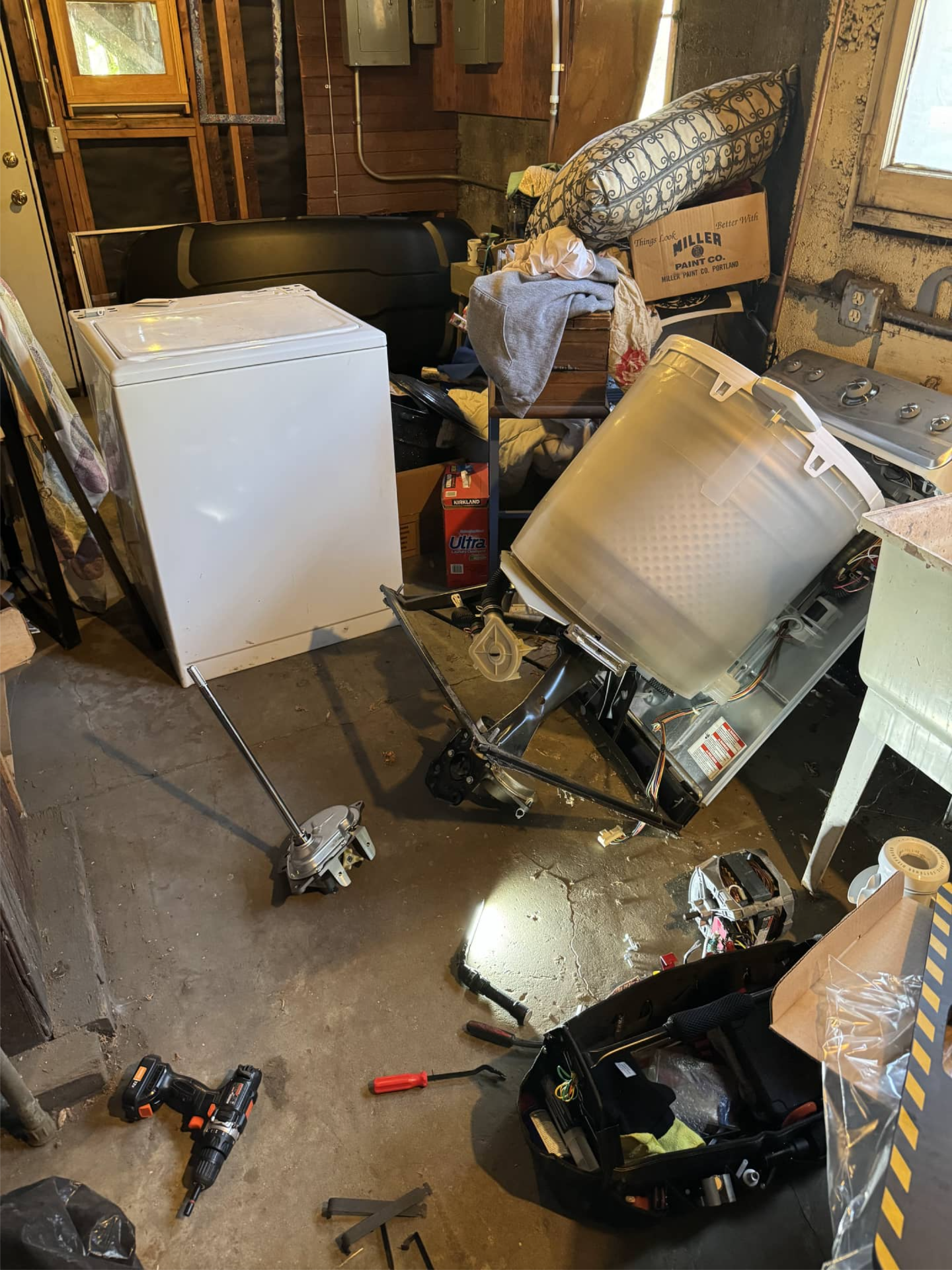 Maytag top load washer disassembled for transmission replacement in Portland, OR 97214