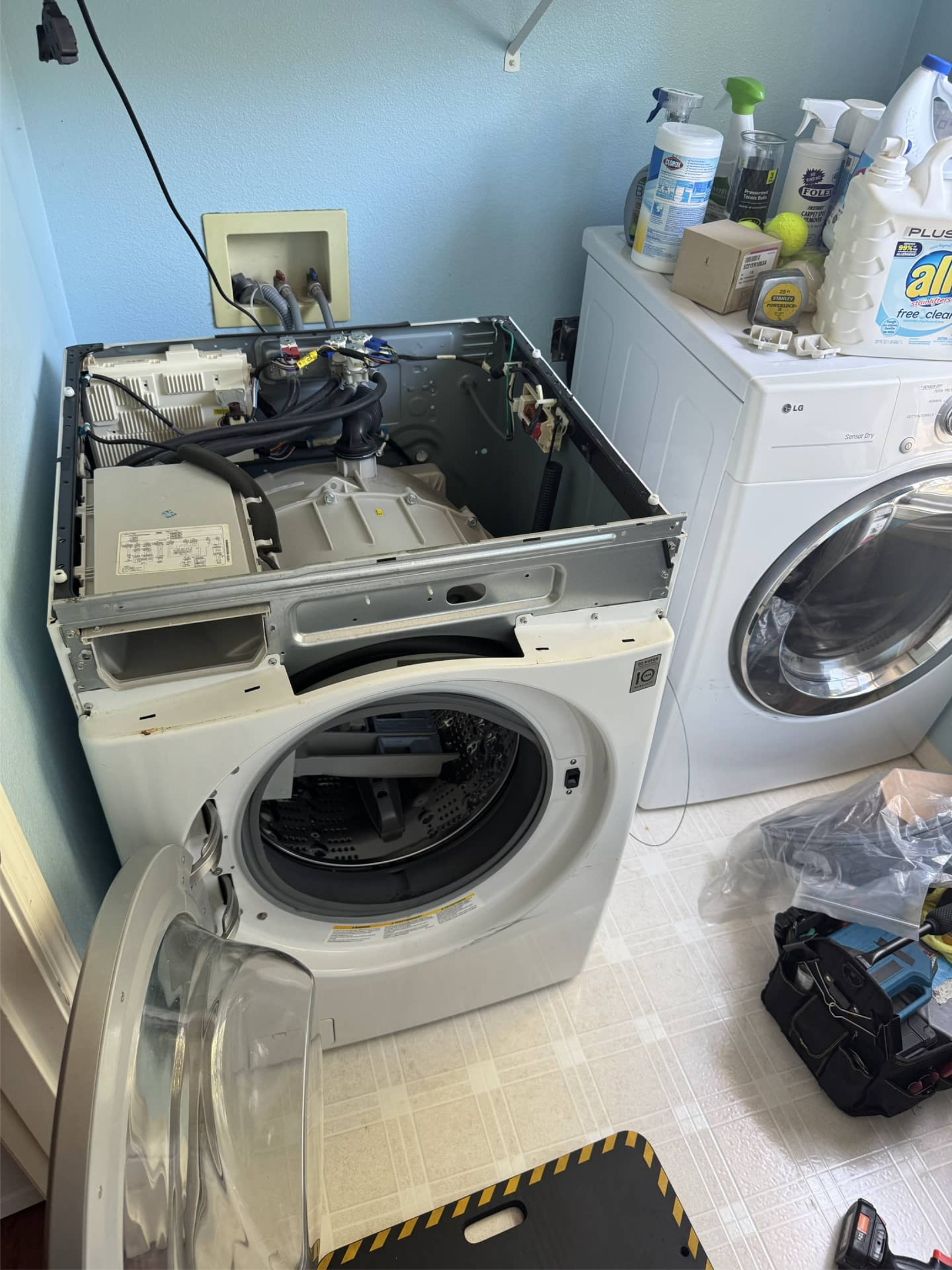 LG front load washer disassembled for moldy door seal replacement in Vancouver, WA 98683