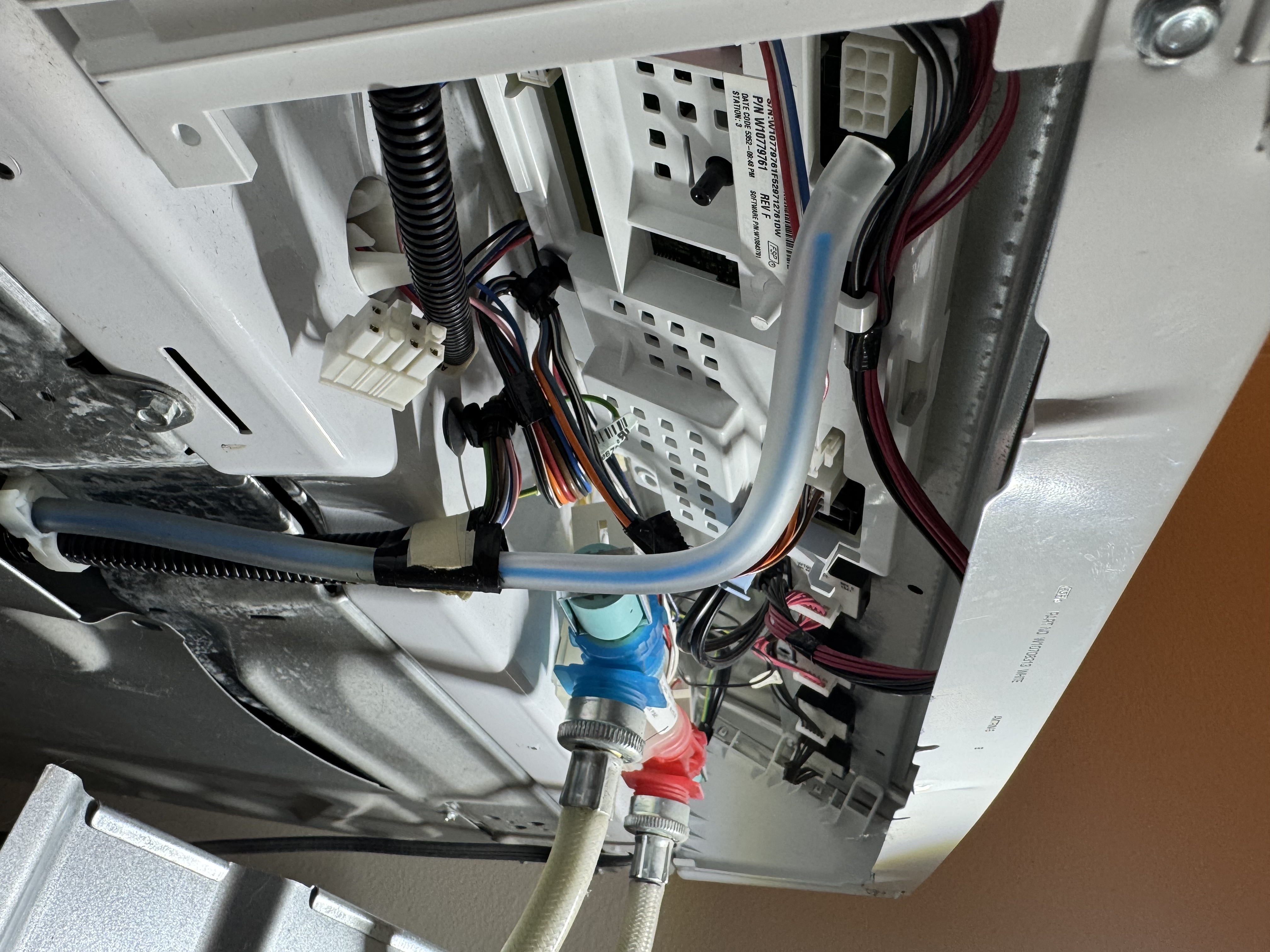 Appliance repair technician servicing Kenmore Washer in Lake Oswego, OR 97034